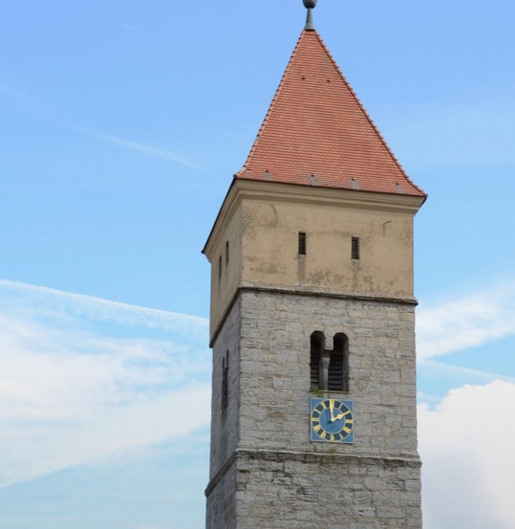 A church tower above a village